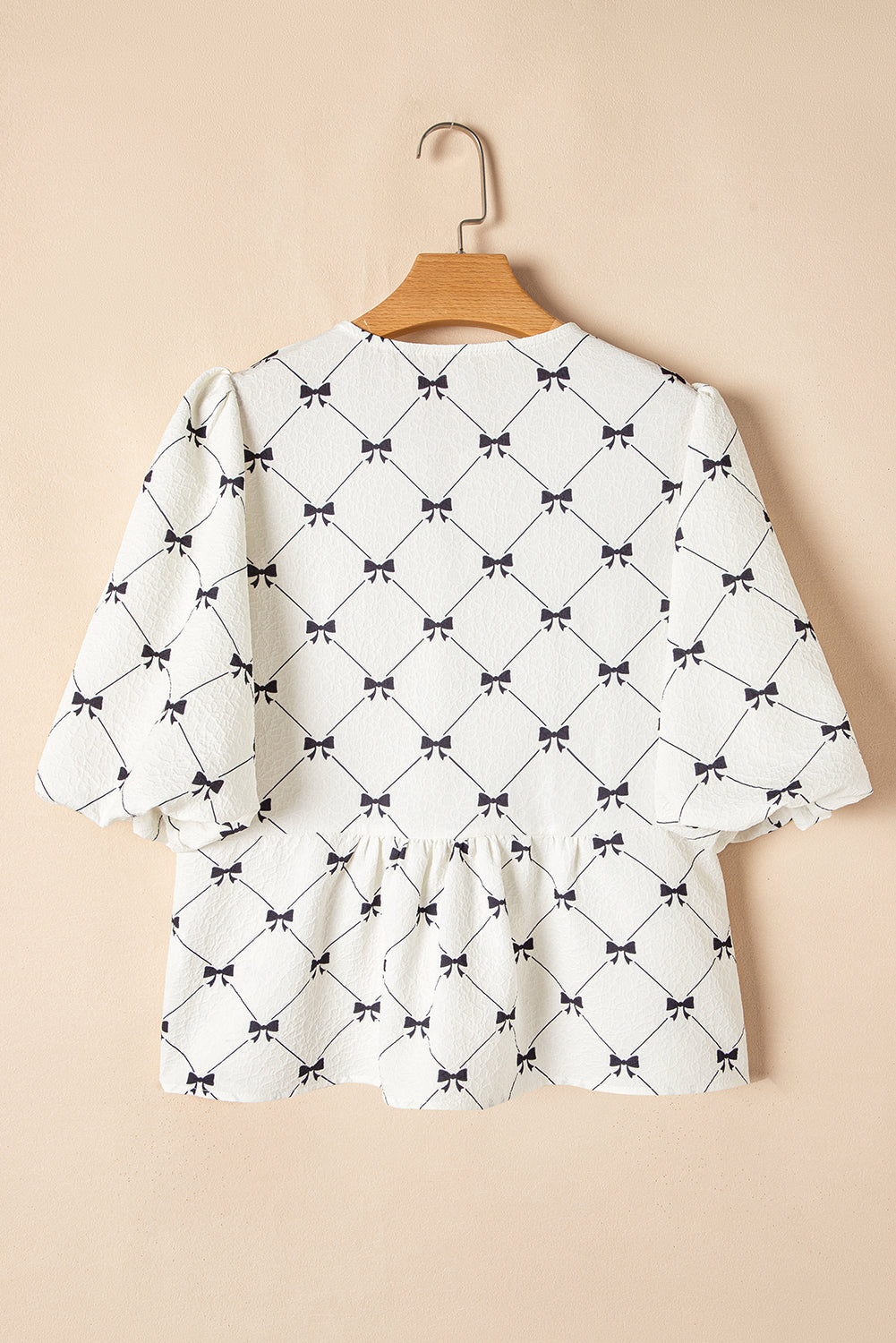 Threaded Pear Ezra Bowknot Print Front Knots Bubble Sleeve Blouse