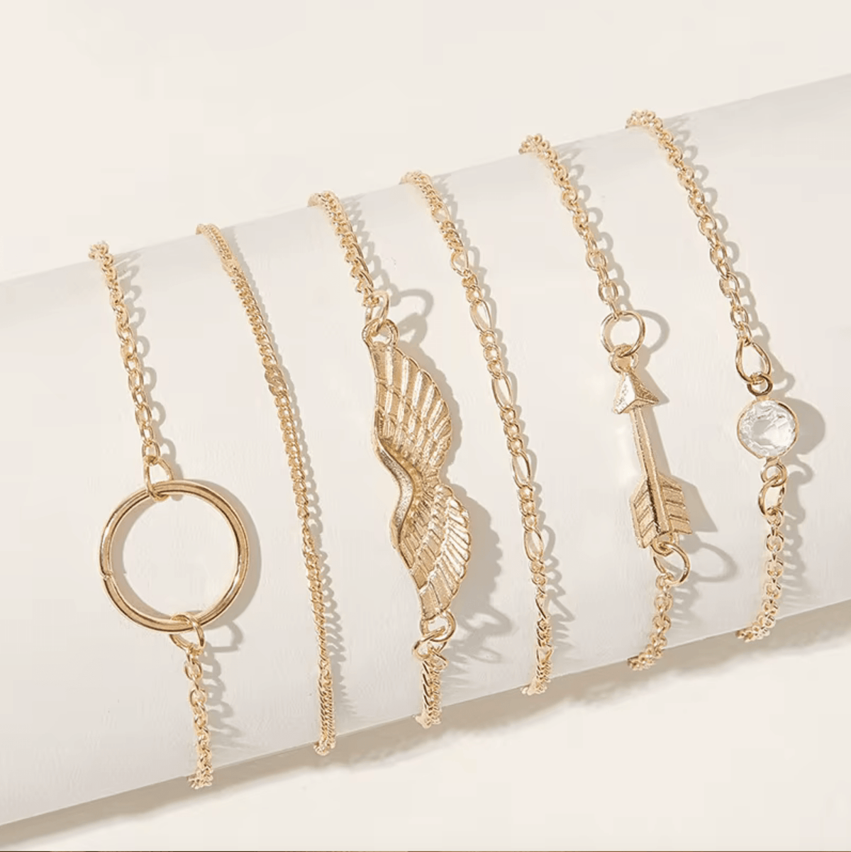 Goldtone Wing Circle Bracelet Set