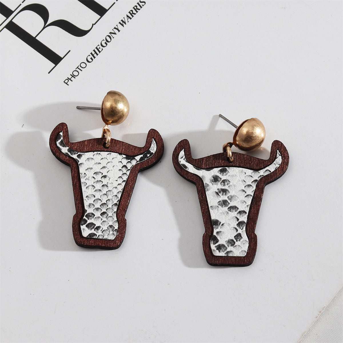 White Polystyrene & Wood Goldtone Serpentine Cattle Drop Earrings