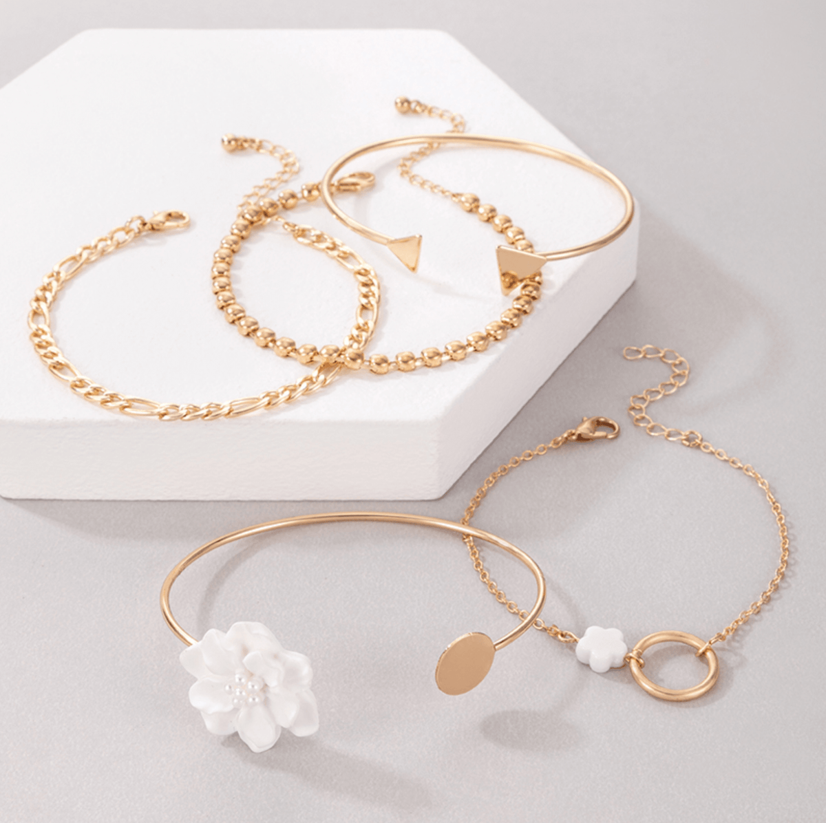Goldtone White Floral Chain Bracelet Set