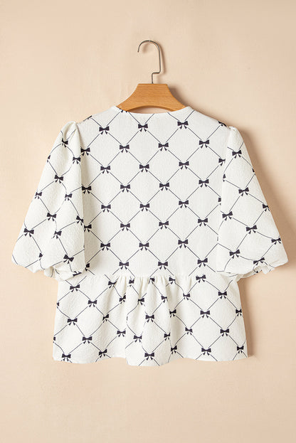 Threaded Pear Ezra Bowknot Print Front Knots Bubble Sleeve Blouse