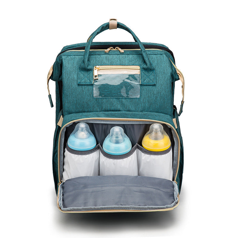 3-in-1 Mommy Bed Backpack with USB Charging | Folding Portable Baby Crib & Diaper Bag | Large Capacity Multi-Function Travel Backpack | Trendy Waterproof Maternity Bag for Moms & Dads | 2026 High-Fashion Smart Parenting Gear