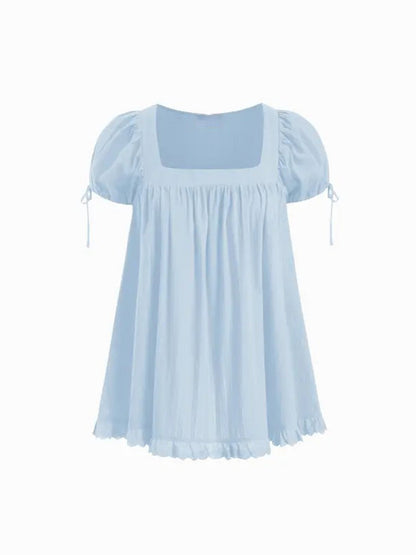 Sweet square neckline, ruffled chest, puff sleeves, adjustable silhouette, casual long shirt
