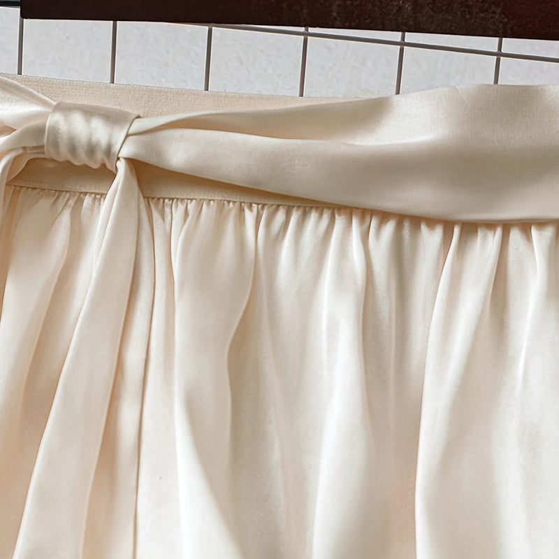 Women’s Solid Color Satin Midi Skirt with Bow Detail | Elegant Pleated Satin Skirt | High-Waisted A-Line Vacation Skirt | Chic Silk-Like Office Midi Skirt | 2026 Modern Luxury Skirt Collection