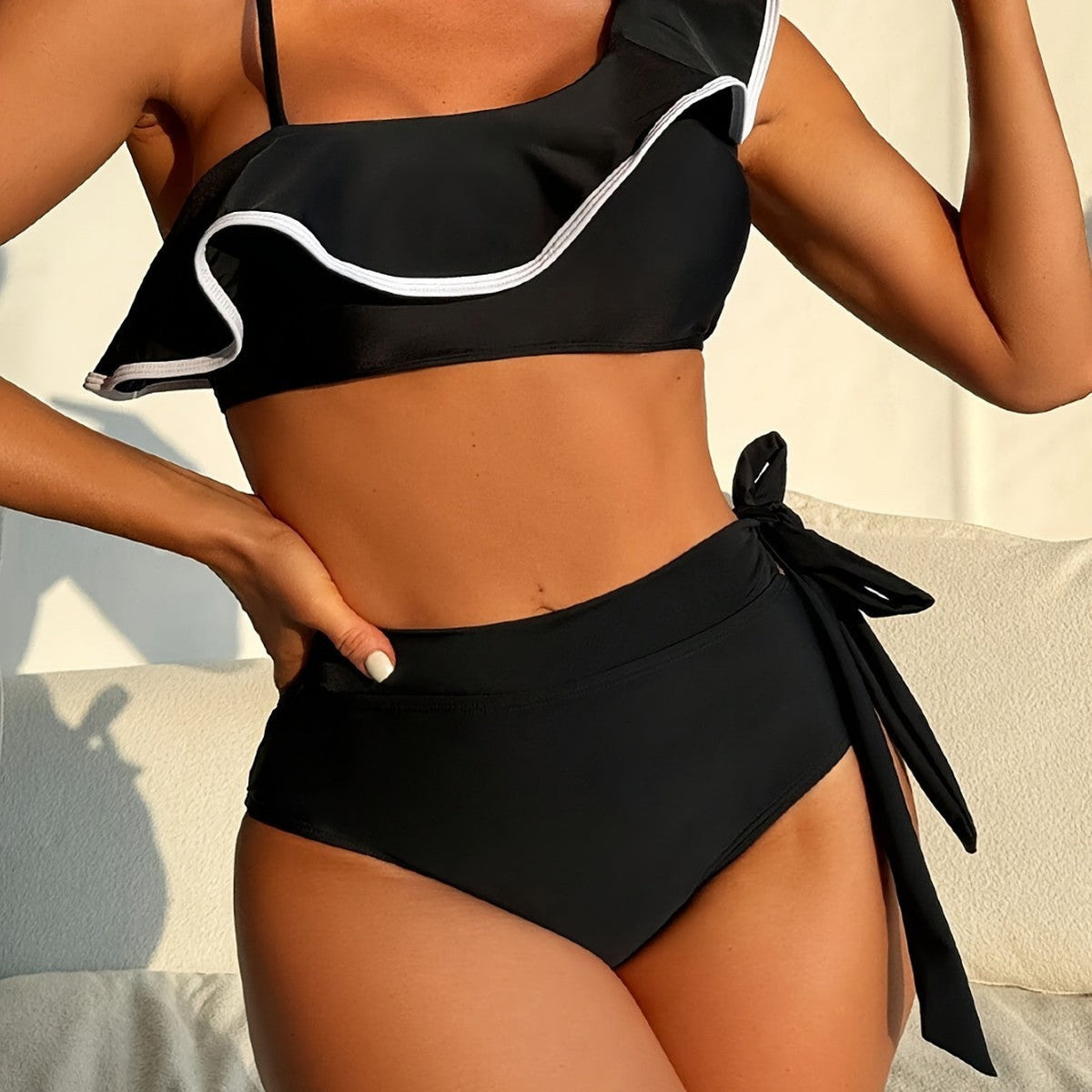 Bikini split swimsuit solid color black shoulder lotus leaf edge