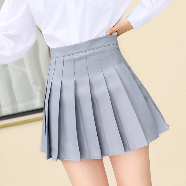 Women’s High-Sense Pleated Short Skirt | Precision-Pressed Minimalist A-Line Skirt | Trendy Academic Style Mini Skirt | Luxury-Label Statuesque Pleated Skort | 2026 High-Fashion Radiant Urban Bottoms