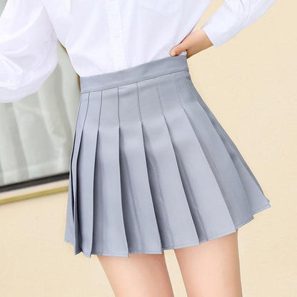 Women’s High-Sense Pleated Short Skirt | Precision-Pressed Minimalist A-Line Skirt | Trendy Academic Style Mini Skirt | Luxury-Label Statuesque Pleated Skort | 2026 High-Fashion Radiant Urban Bottoms