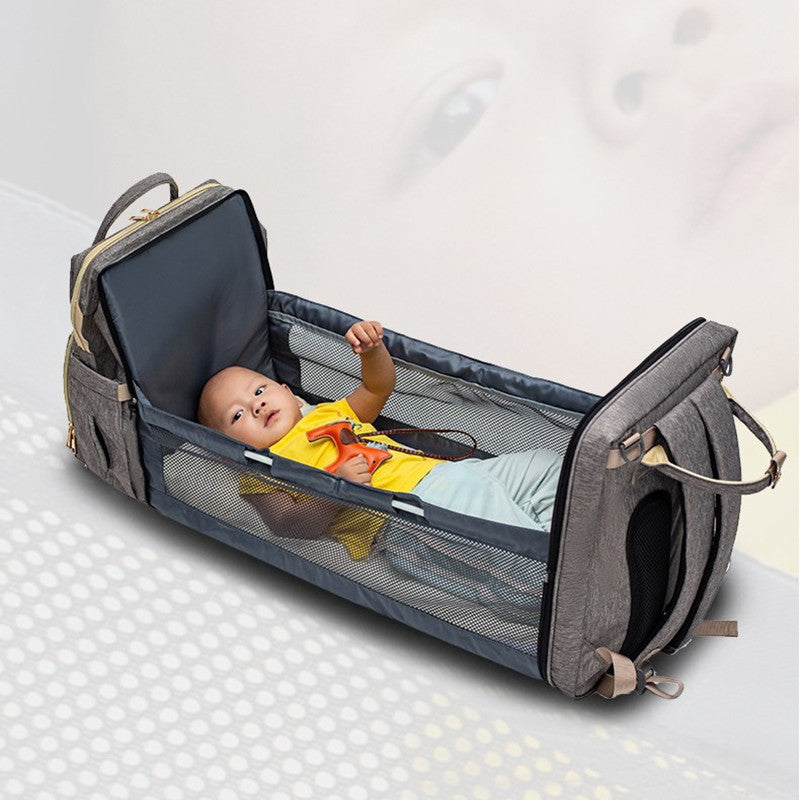 3-in-1 Mommy Bed Backpack with USB Charging | Folding Portable Baby Crib & Diaper Bag | Large Capacity Multi-Function Travel Backpack | Trendy Waterproof Maternity Bag for Moms & Dads | 2026 High-Fashion Smart Parenting Gear