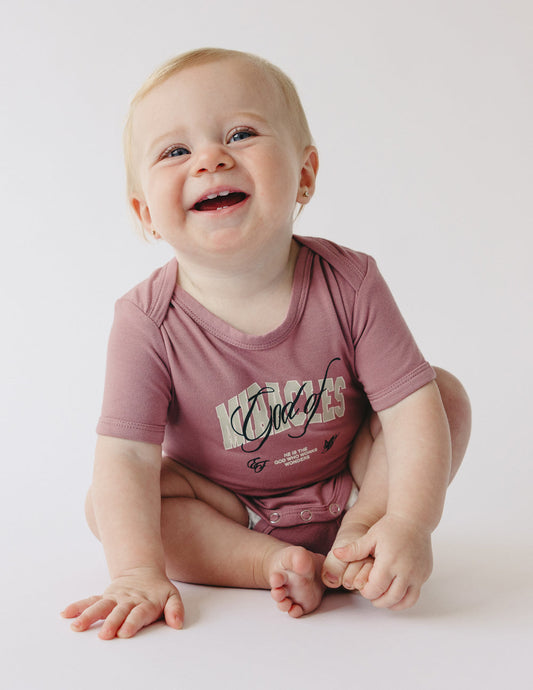 Elevated Faith God of Miracles Onesie