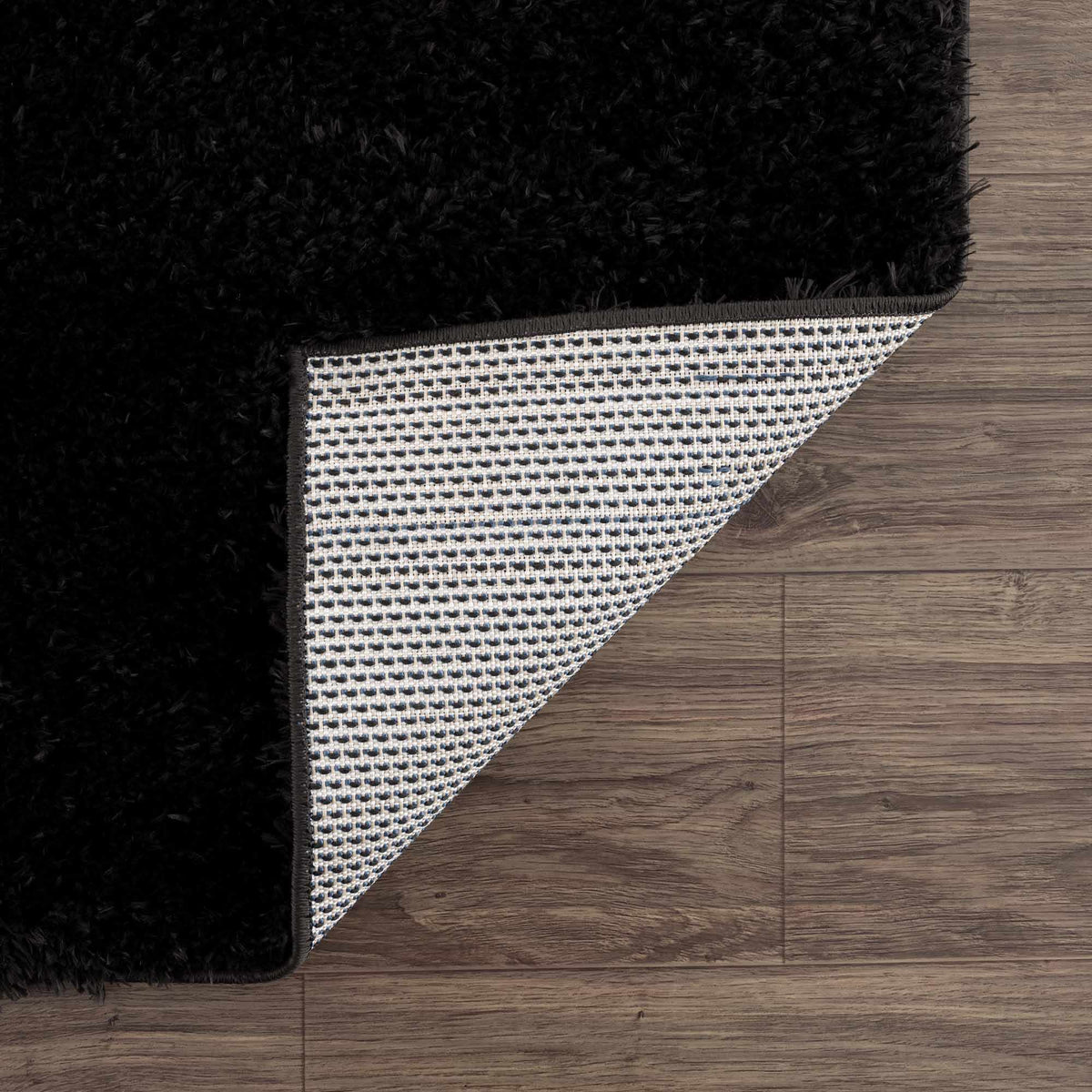 Faina Solid Black Shag Washable Area Rug
