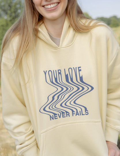 Elevated Faith Love Never Fails Cream Unisex Hoodie