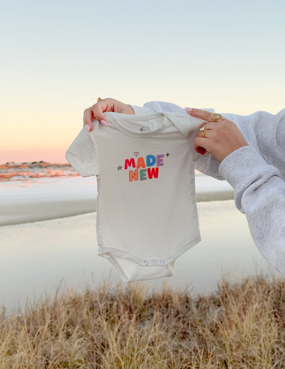 Elevated Faith Made New Onesie