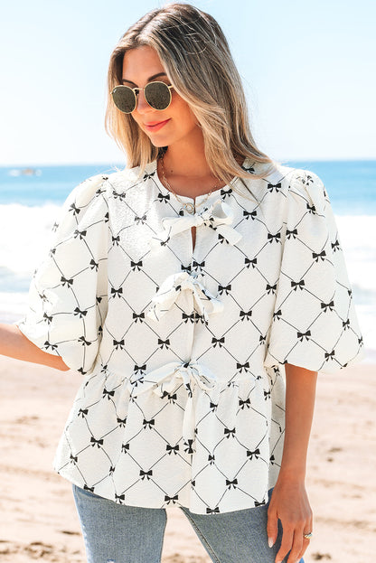 Threaded Pear Ezra Bowknot Print Front Knots Bubble Sleeve Blouse