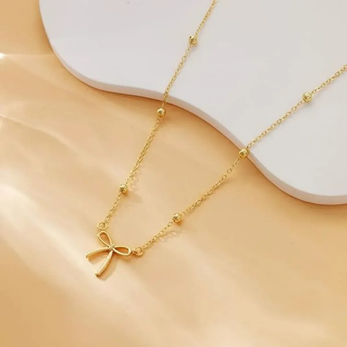Elegant Bow Pendant Beaded Chain Necklace