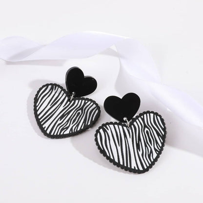 Black Acrylic & Silvertone Zebra Stripe Heart Drop Earrings