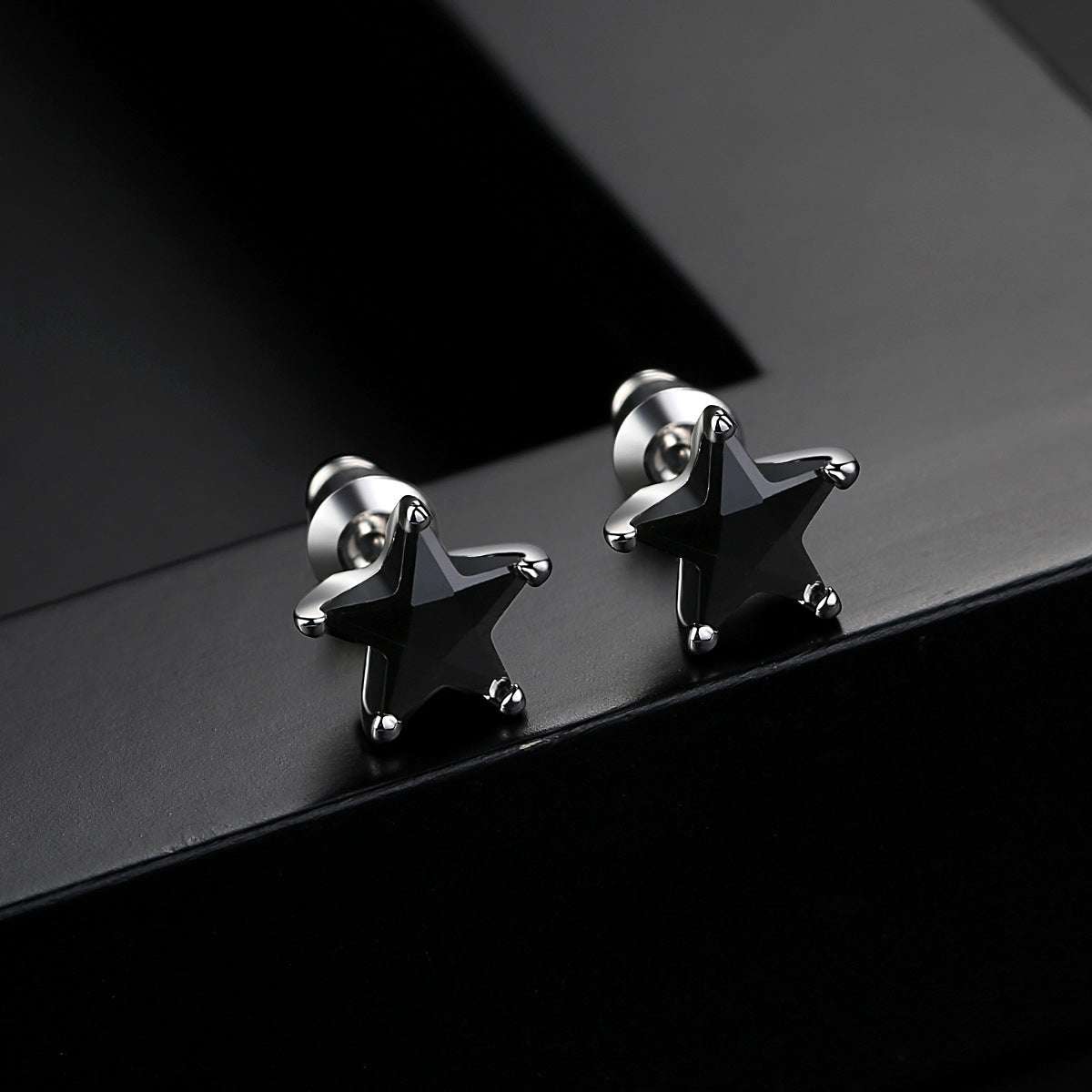 Black Crystal & Silvertone Star Stud Earrings