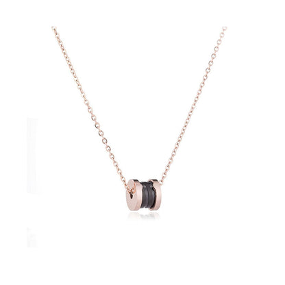 Black Acrylic & Rose Goldtone Coil Pendant Necklace