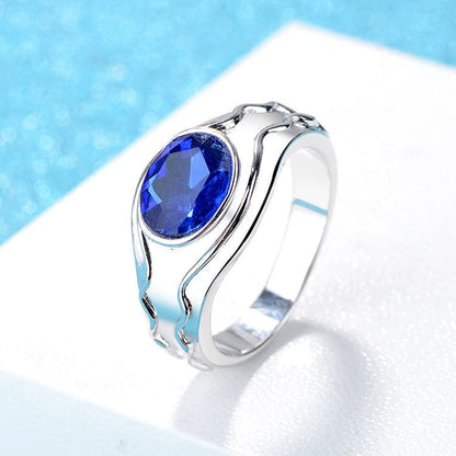 Blue Oval Crystal & Silvertone Band Ring