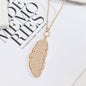 Beige Polyurethane & Goldtone Weave Leaf Pendant Necklace