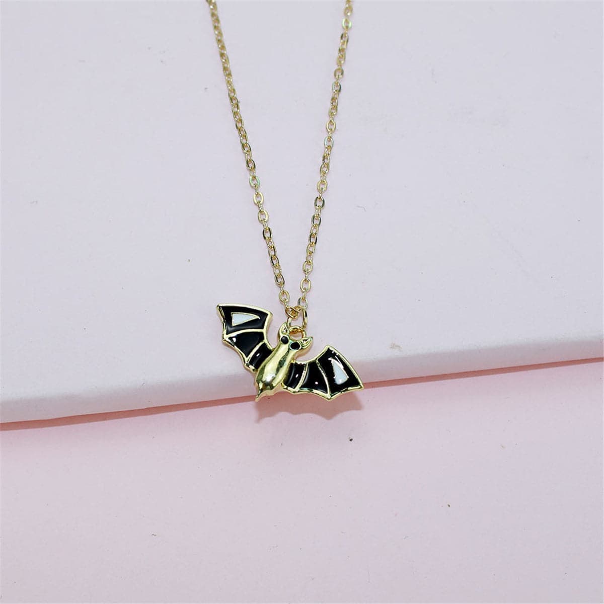 Black & Goldtone Bat Pendant Necklace & Drop Earrings