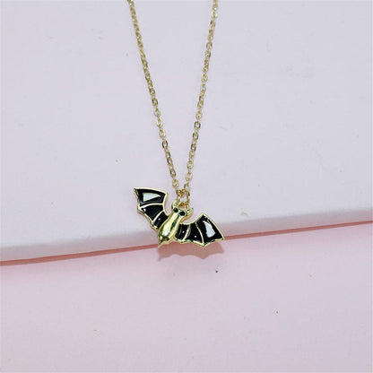 Black & Goldtone Bat Pendant Necklace & Drop Earrings