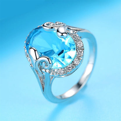 Blue Topaz & Cubic Zirconia Oval Halo Ring