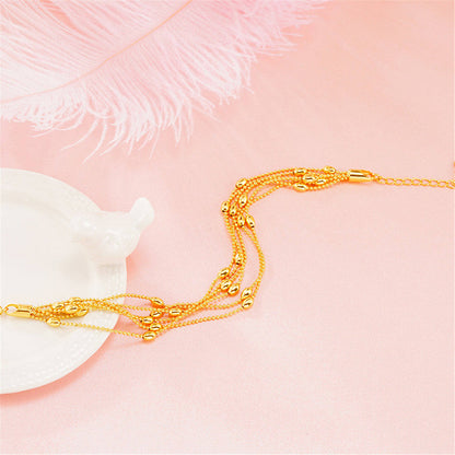 24k Goldtone Circle Bead Layered Station Bracelet