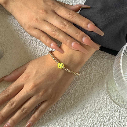 Acrylic & Goldtone Smiley Charm Stretch Bracelet