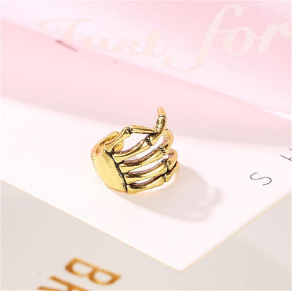 Goldtone Skeleton Hand Ear Cuff