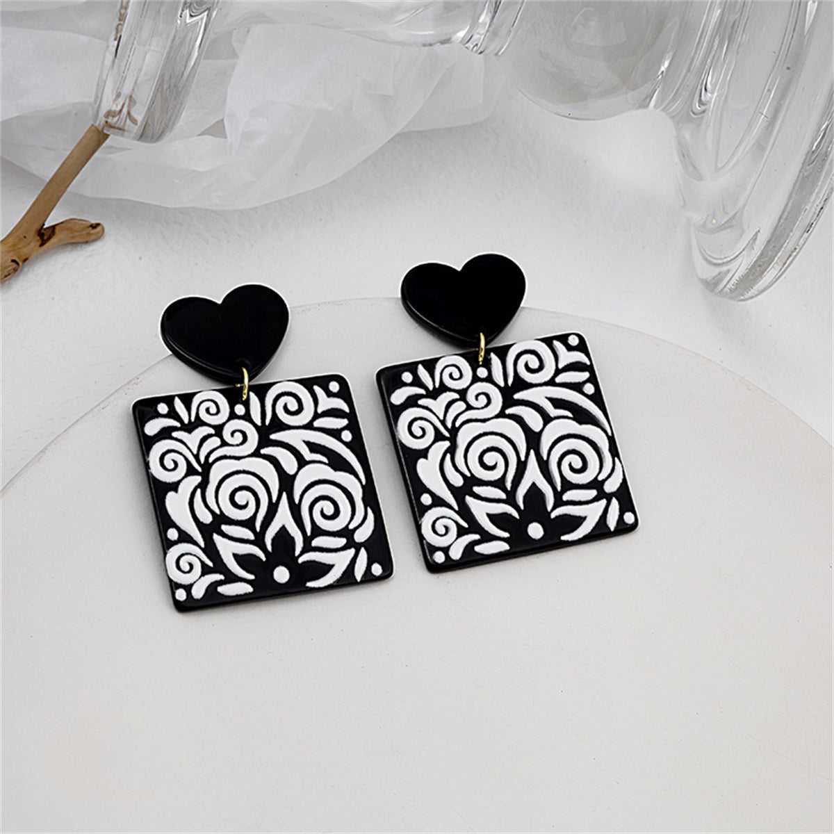 Black Acrylic Heart Swirl Earrings