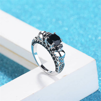 Black Crystal & Silvertone Skull Rose Ring