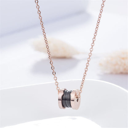 Black Acrylic & Rose Goldtone Coil Pendant Necklace