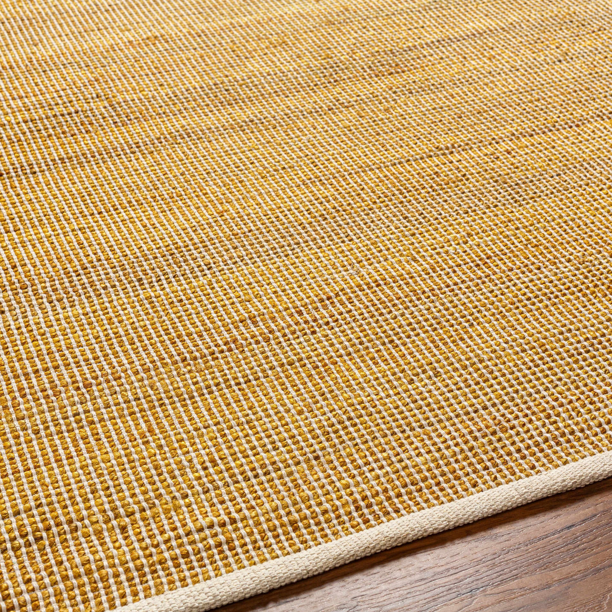 Byrne Tan Area Rug - Clearance