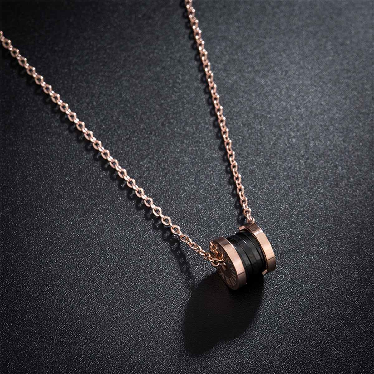 Black Acrylic & Rose Goldtone Coil Pendant Necklace