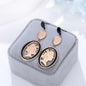 Black Acrylic & Rose Goldtone Queen Cameo Drop Earrings