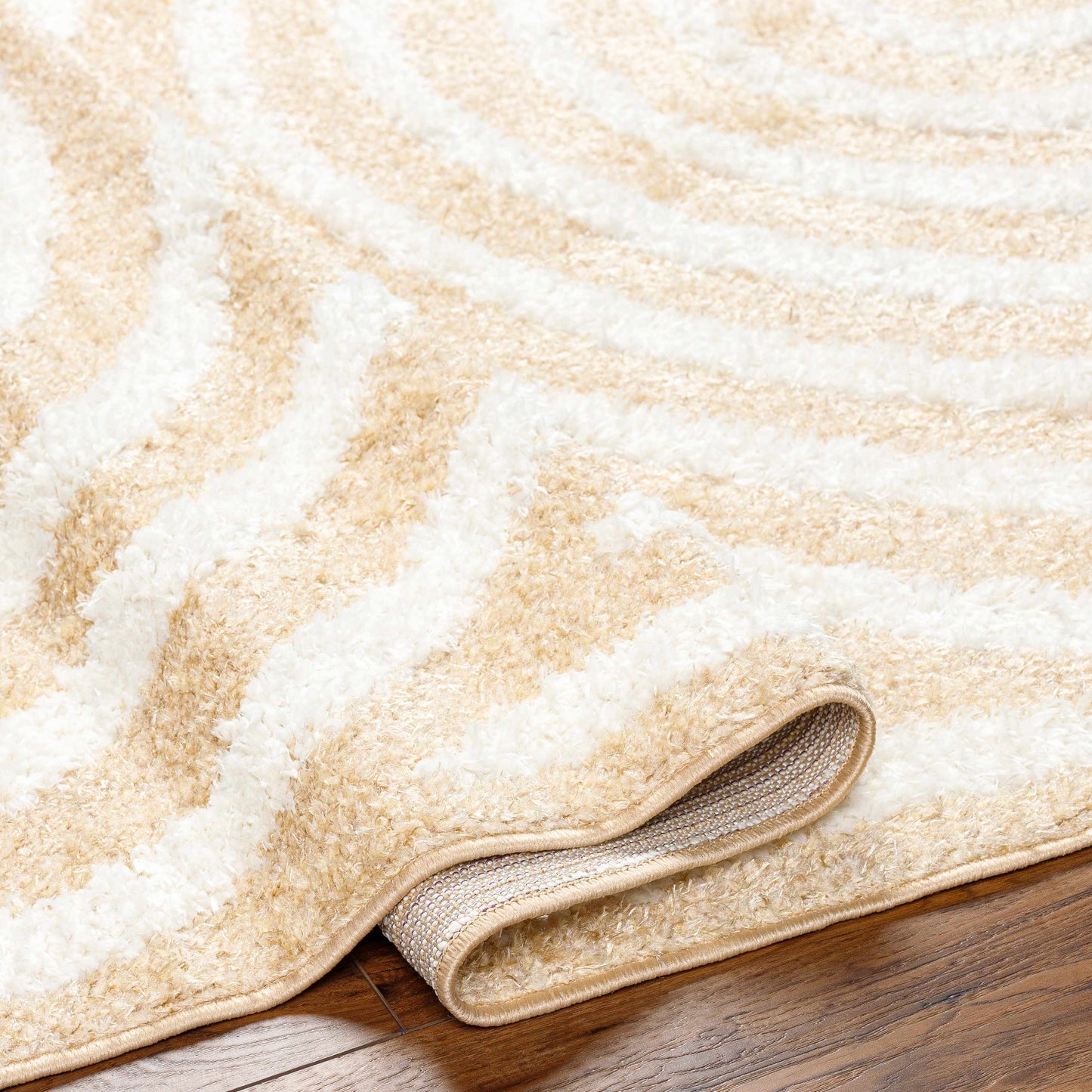 Arnel Beige Area Rug - Clearance