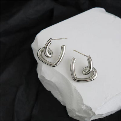 Silvertone Swirl-Heart Stud Earrings