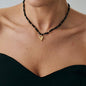 Black Acrylic & Goldtone Heart Pendant Necklace