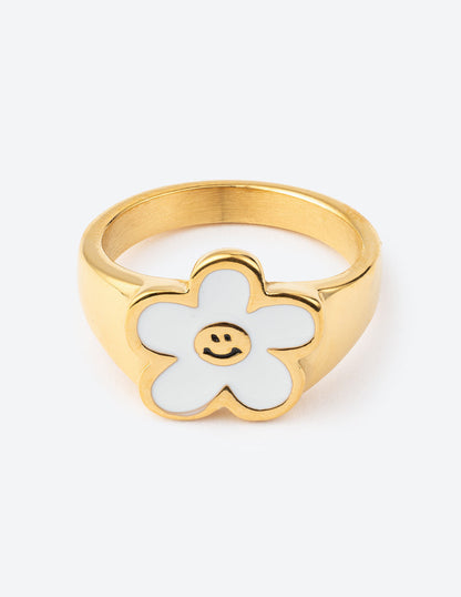 Elevated Faith White Smiley Flower Ring
