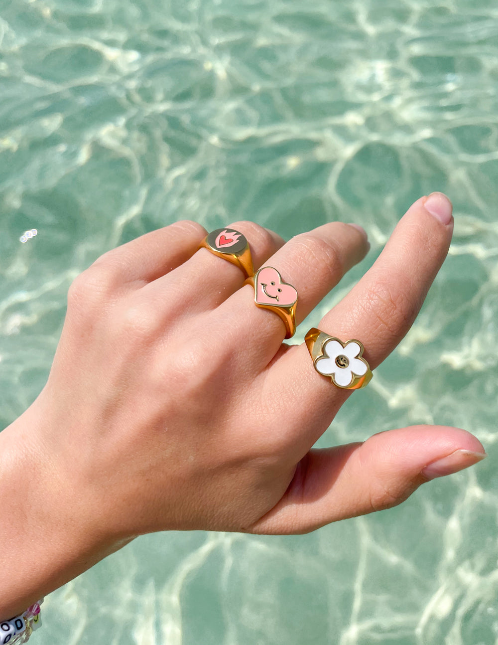 Elevated Faith White Smiley Flower Ring