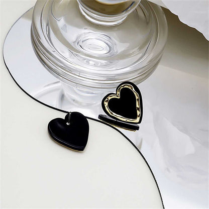 Black Acrylic & Goldtone Heart Stud Earrings