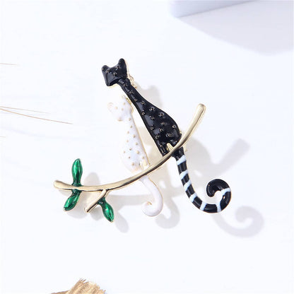 Black & White Enamel Goldtone Double Spotted Cat Brooch