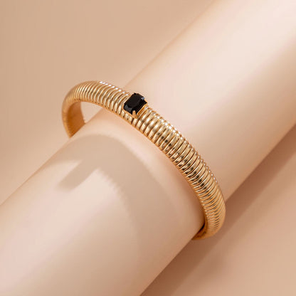 Black Crystal & Goldtone Herringbone Bangle