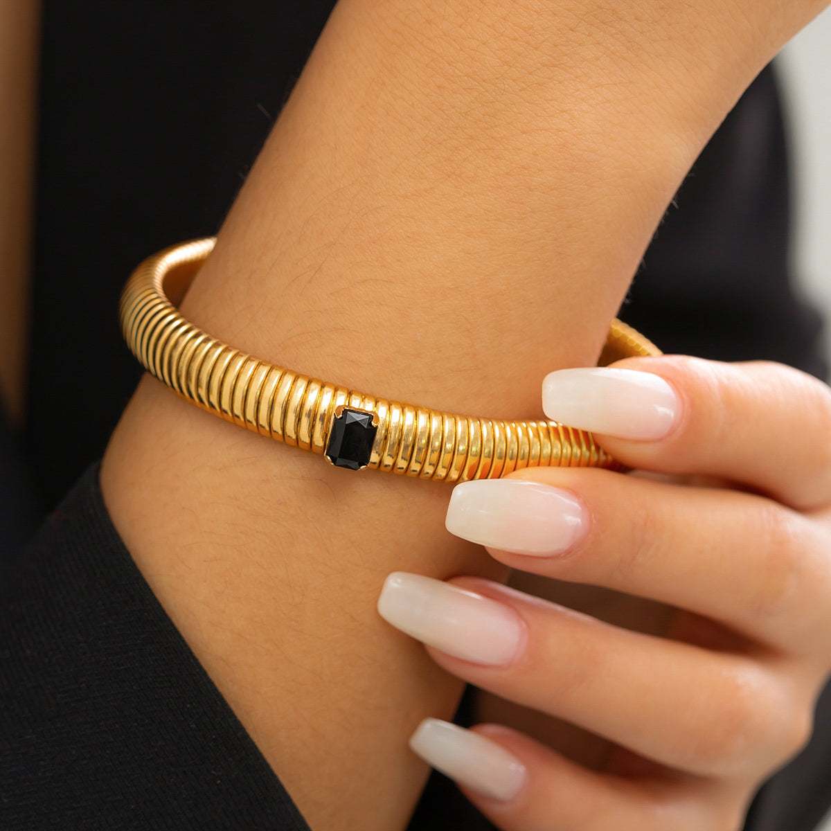 Black Crystal & Goldtone Herringbone Bangle